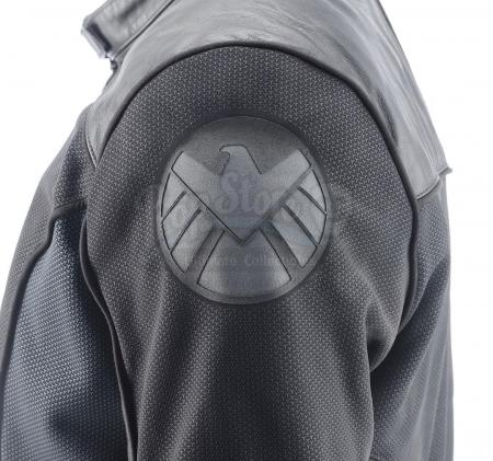 Lot #49 - Marvel's Agents of S.H.I.E.L.D. - Mike Peterson's Stunt Bloody S.H.I.E.L.D. Field Jacket with Knife Wound - 5